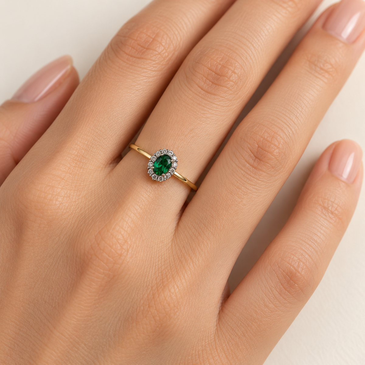 deep-green oval halo ring
