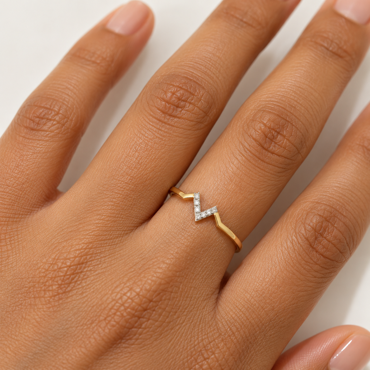 delicate gold chevron ring