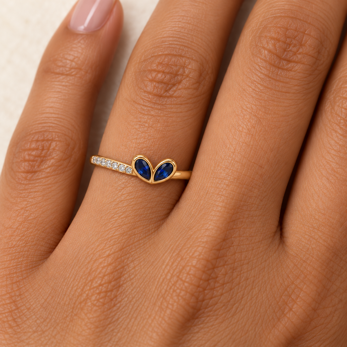 navy two-petal gold ring