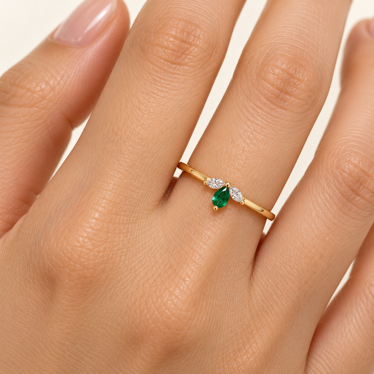 gold leaf ring with green pear stone