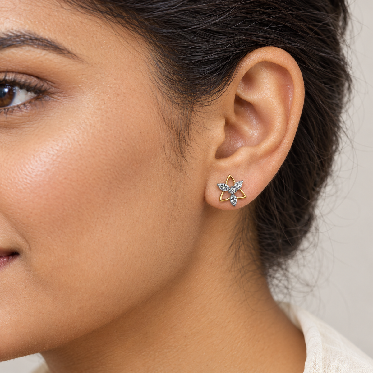 gold and silver floral stud earrings