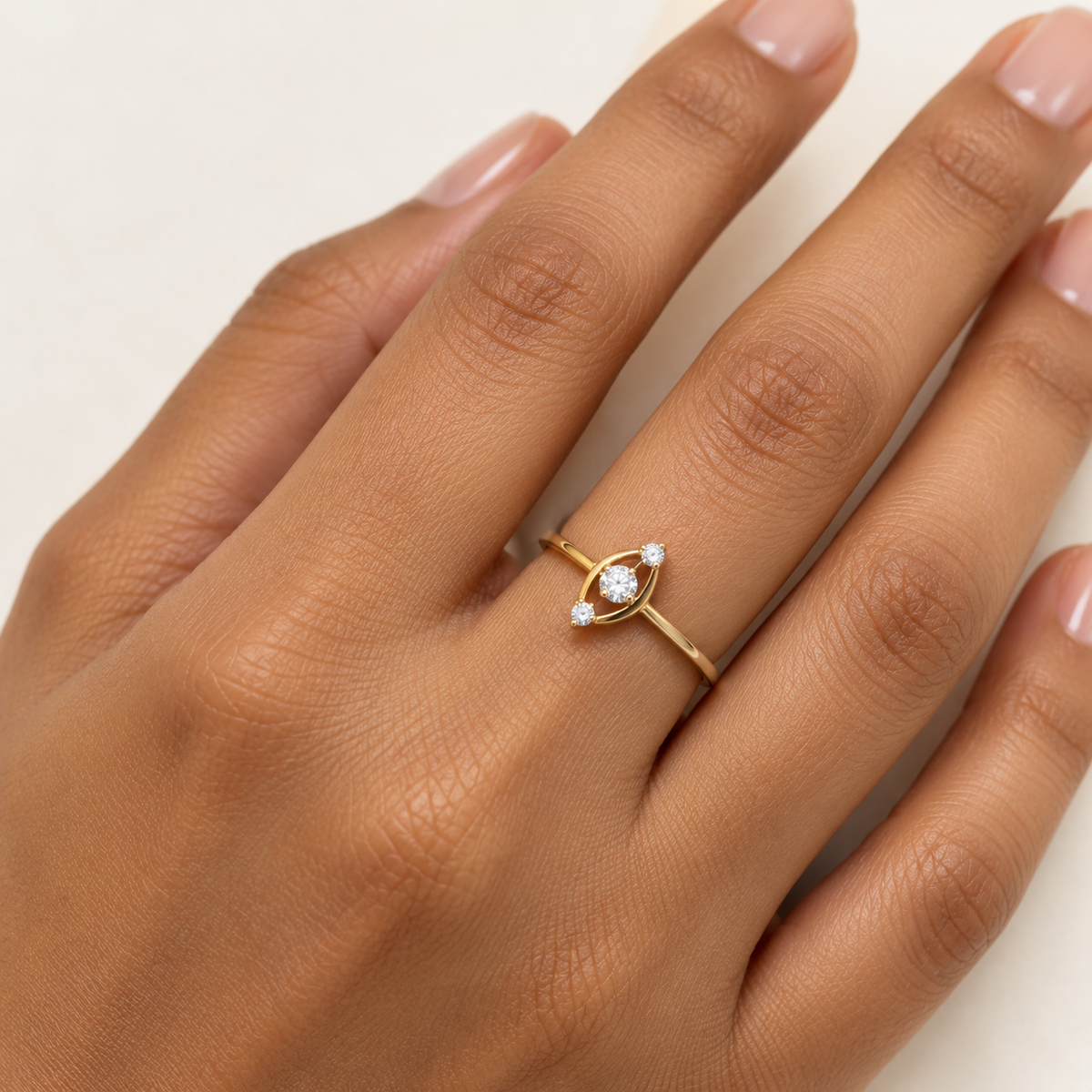 Delicate Three-Stone Gold Ring