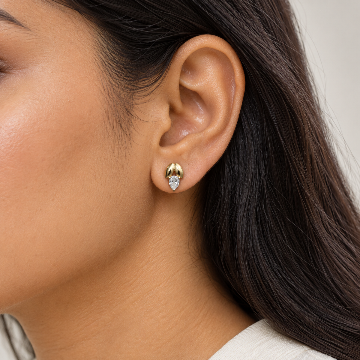 pear-shaped gold stud earrings