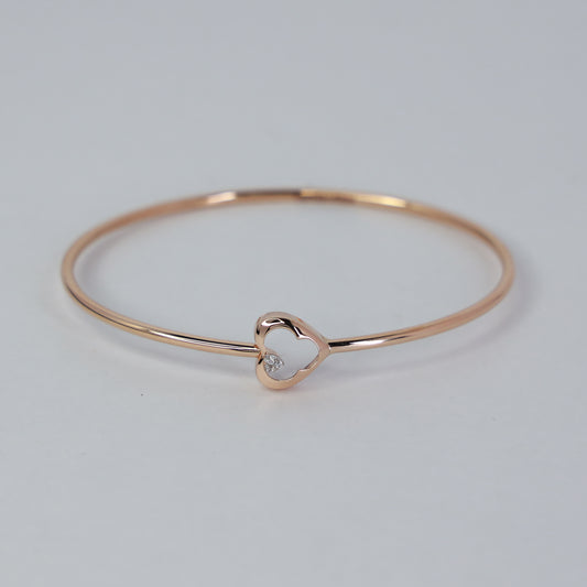 HEART GLOW 18KT GOLD BANGLE