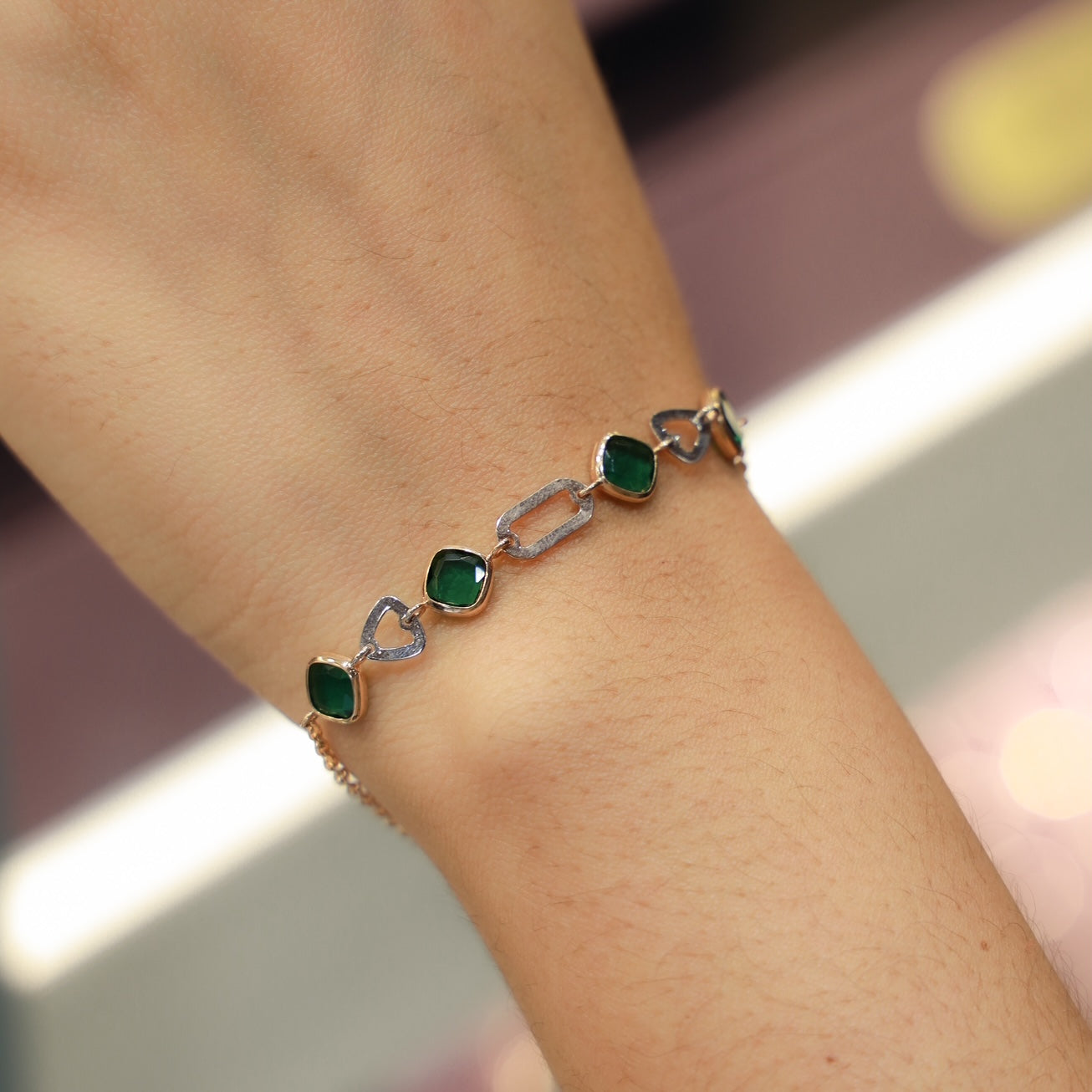 18kt gold green stone dual link bracelet