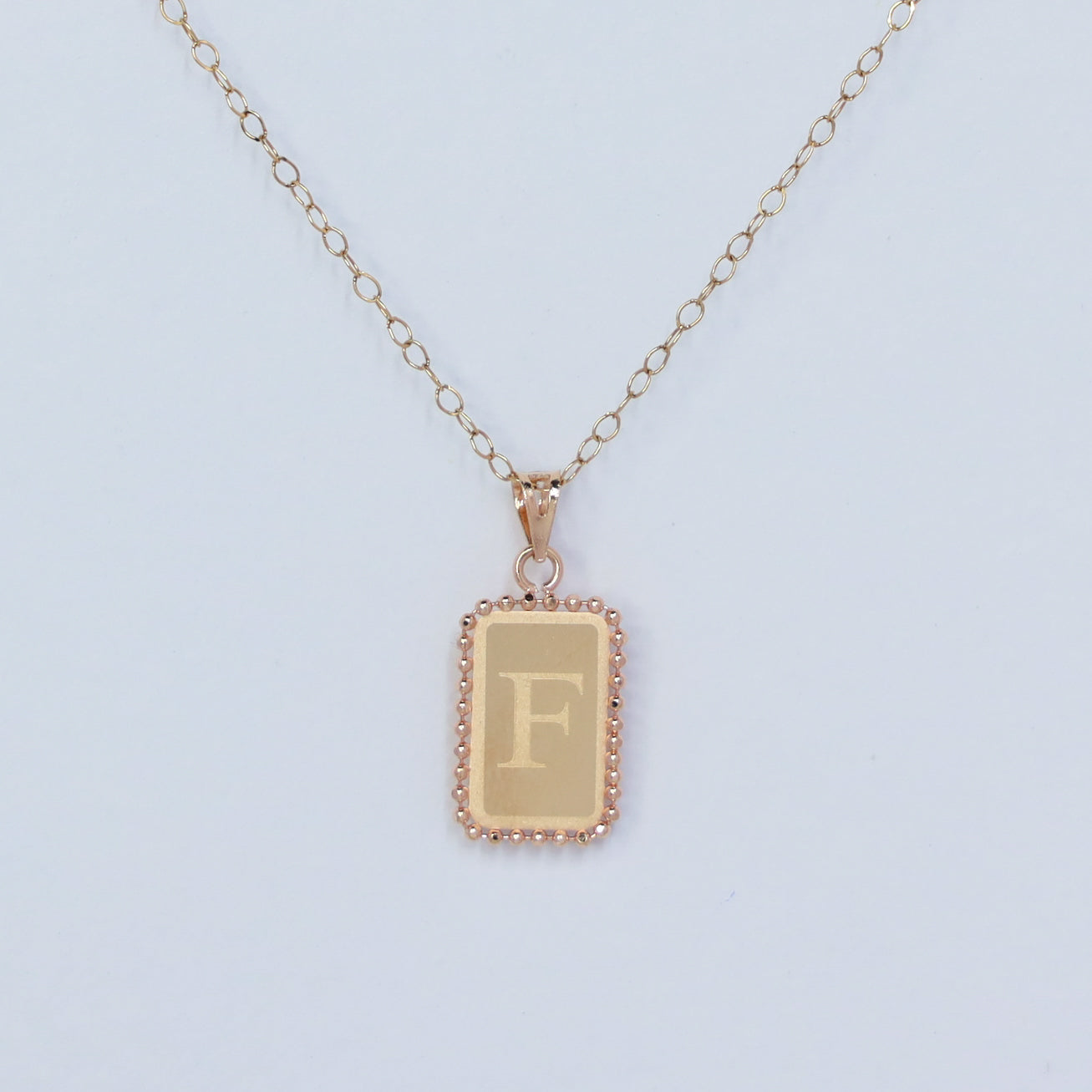 rectangle letter f 18kt gold  pendant