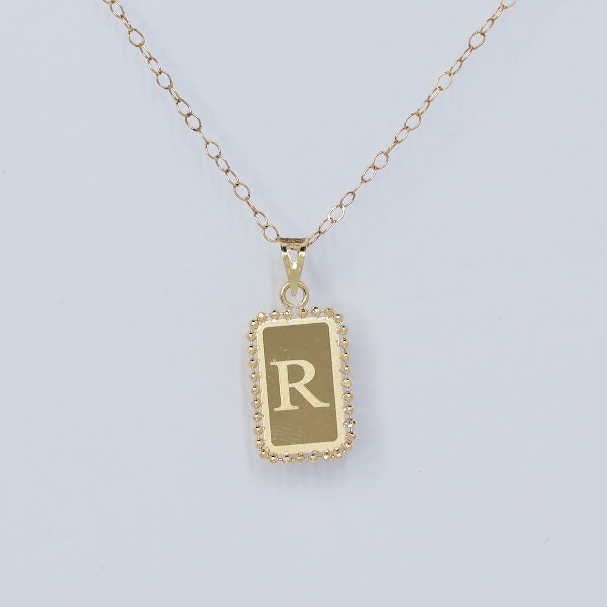 rectangle letter r 18kt gold pendant