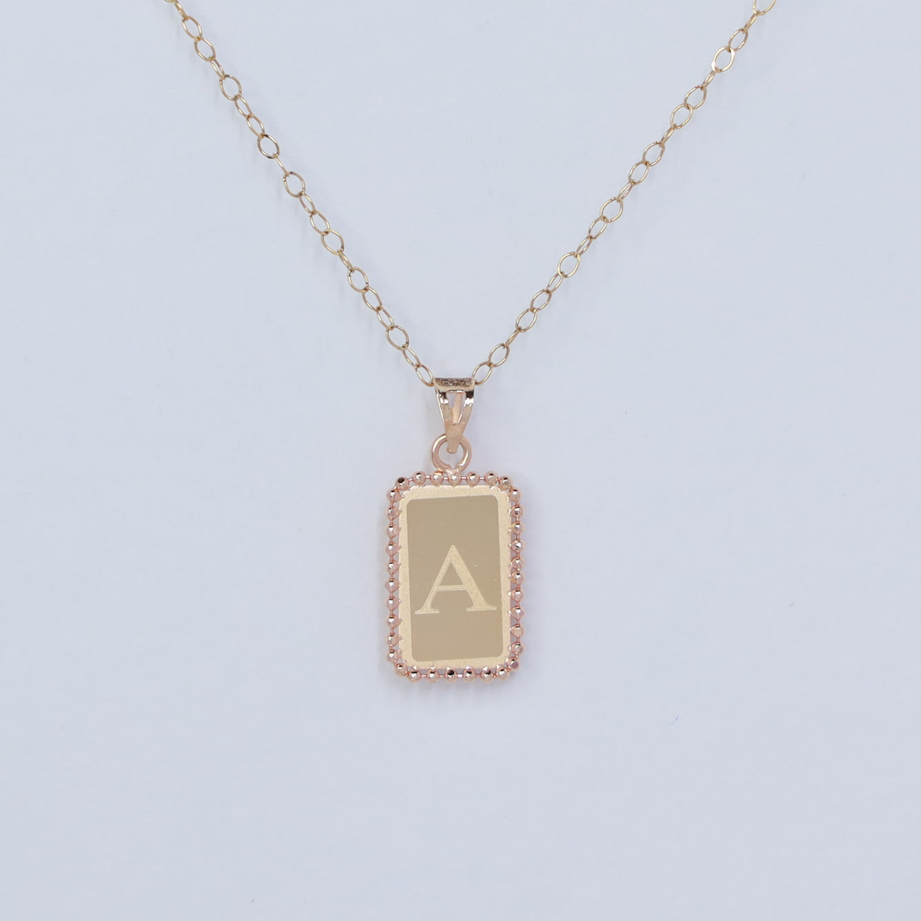 rectangle letter a 18kt gold pendant