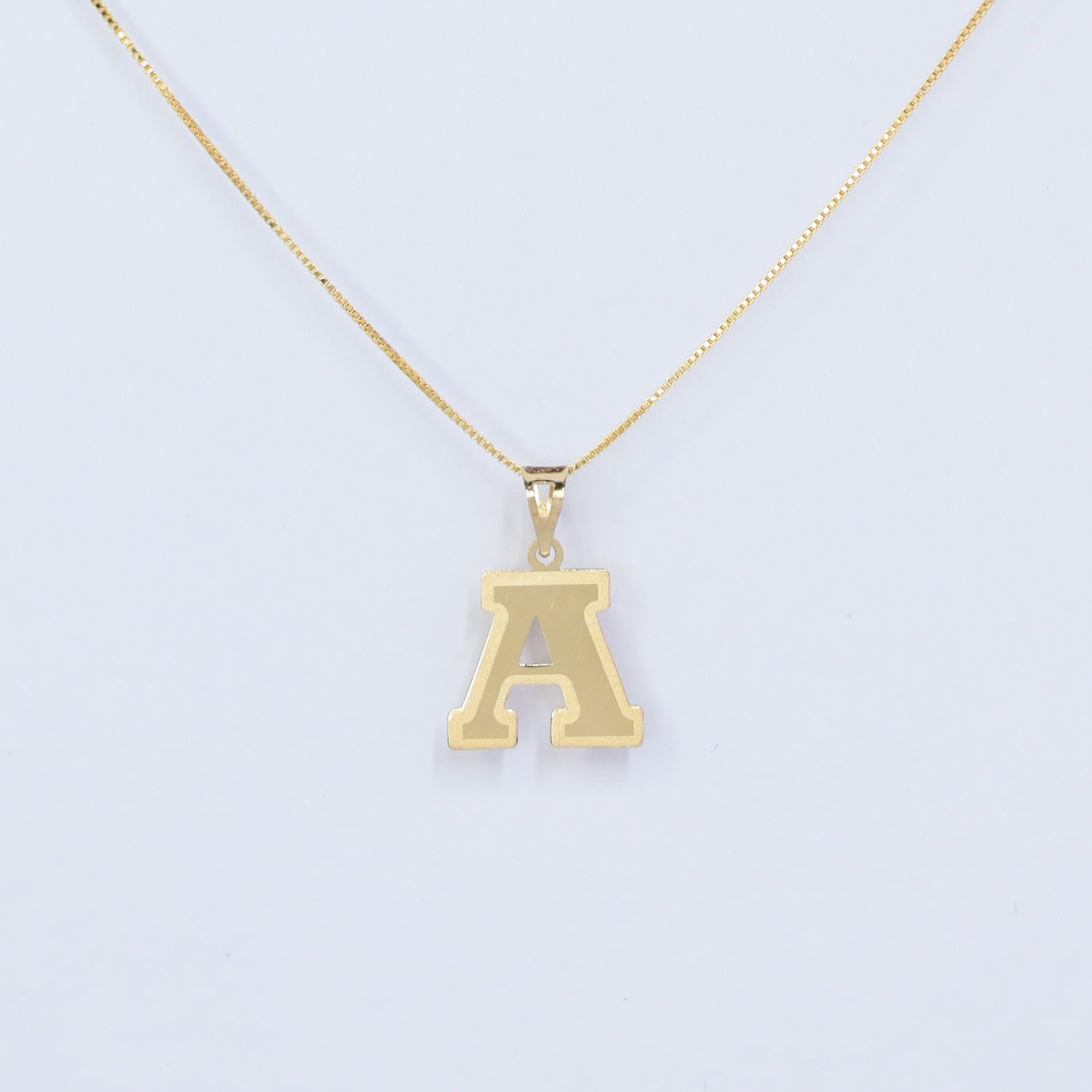 initial a 18kt gold pendant