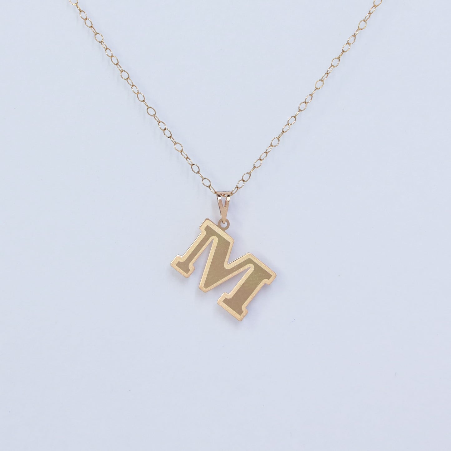 initial m 18kt gold pendant