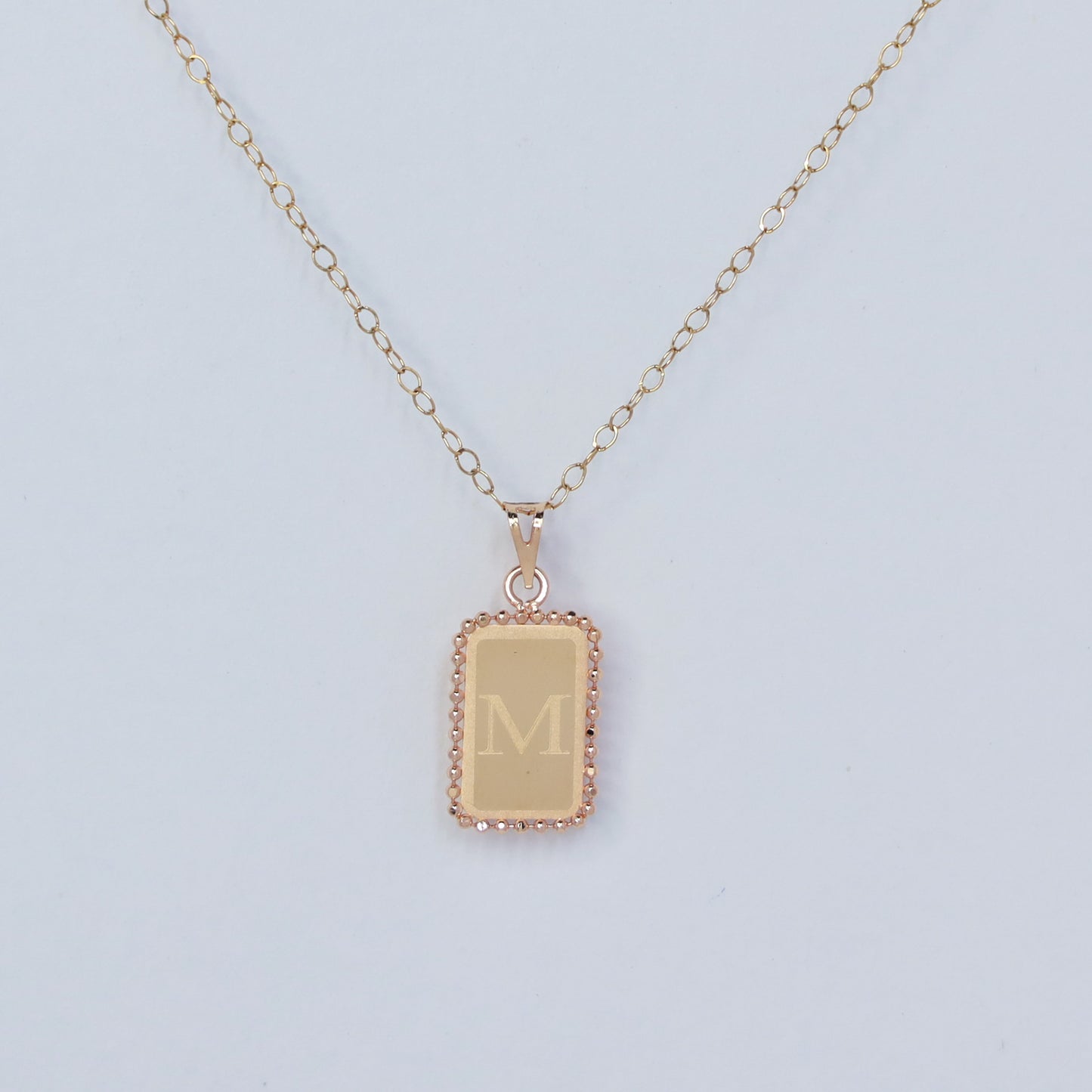 rectangle letter m 18kt gold  pendant