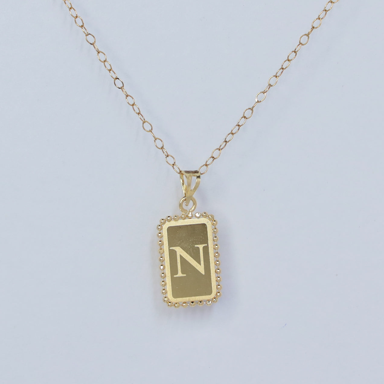 rectangle letter n 18kt gold pendant