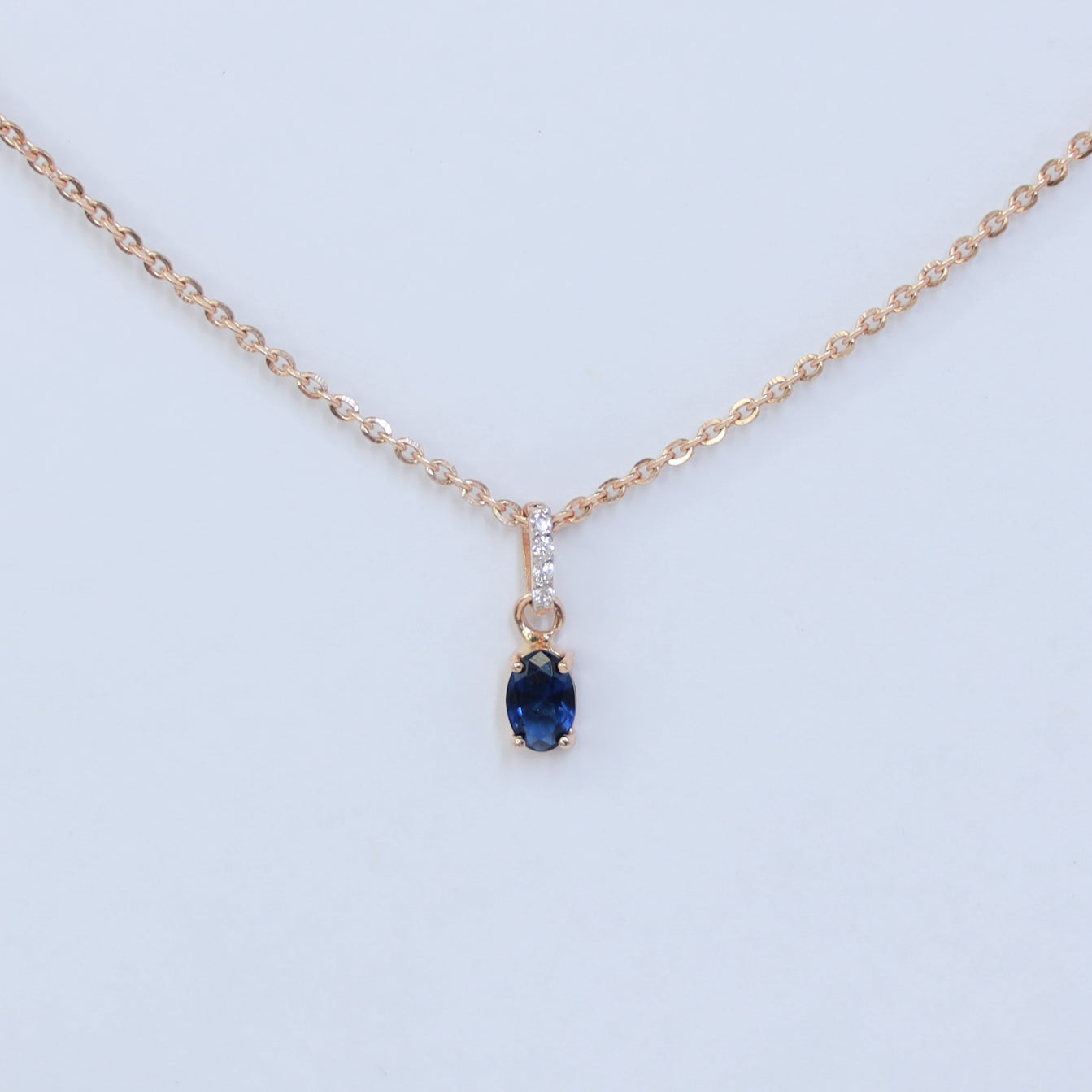 18kt gold blue drop cz pendant