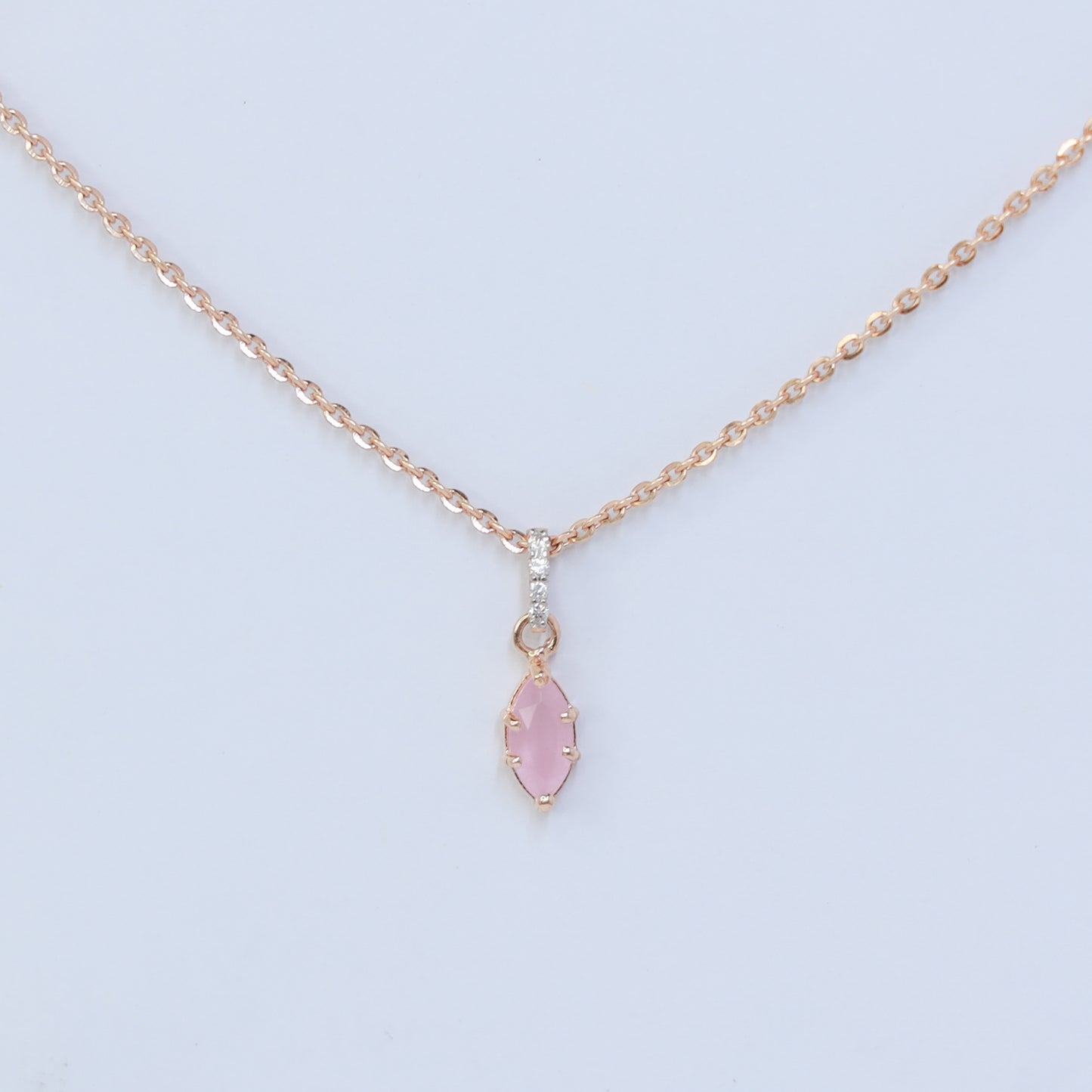 18kt gold rose quartz cz pendant