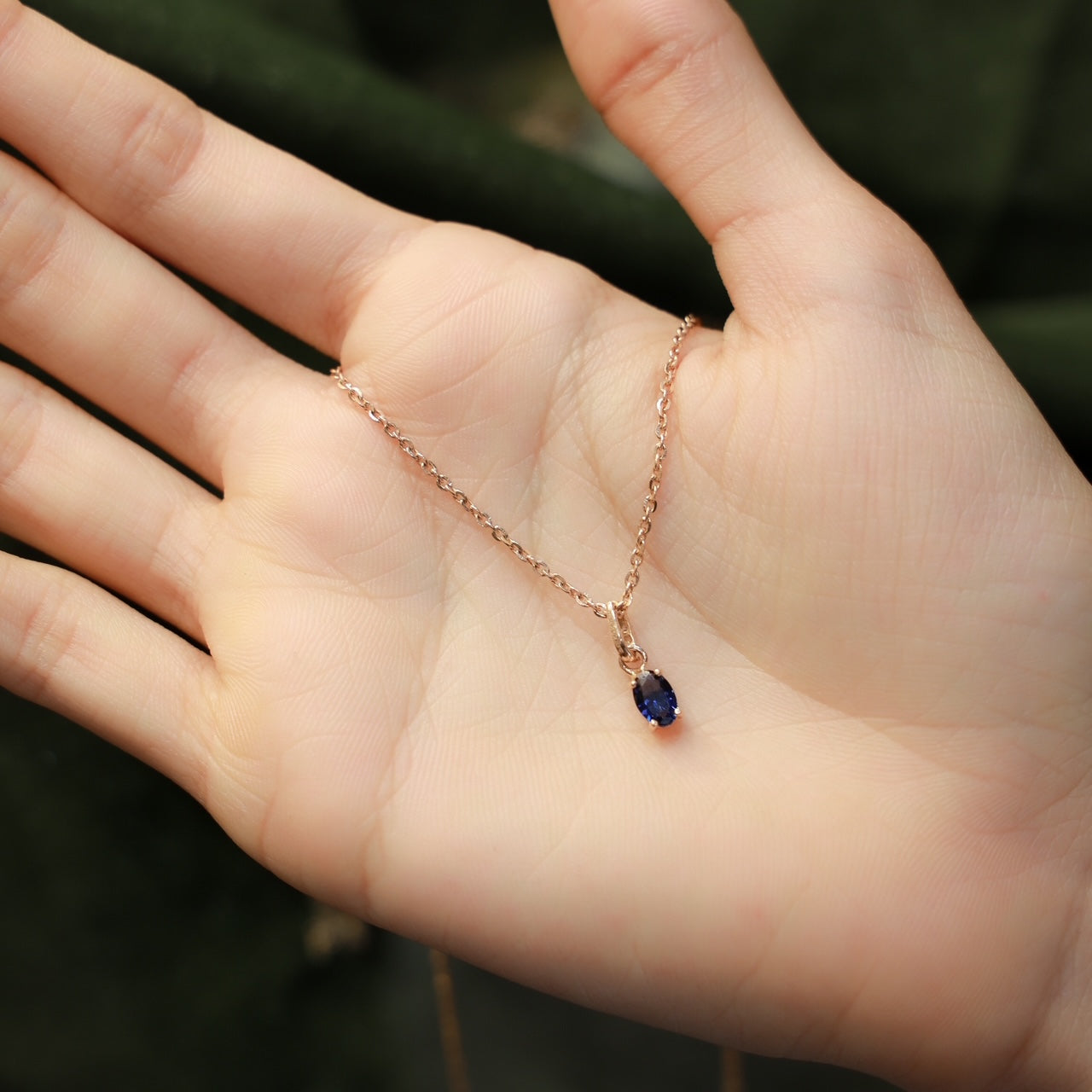 18kt gold blue drop cz pendant