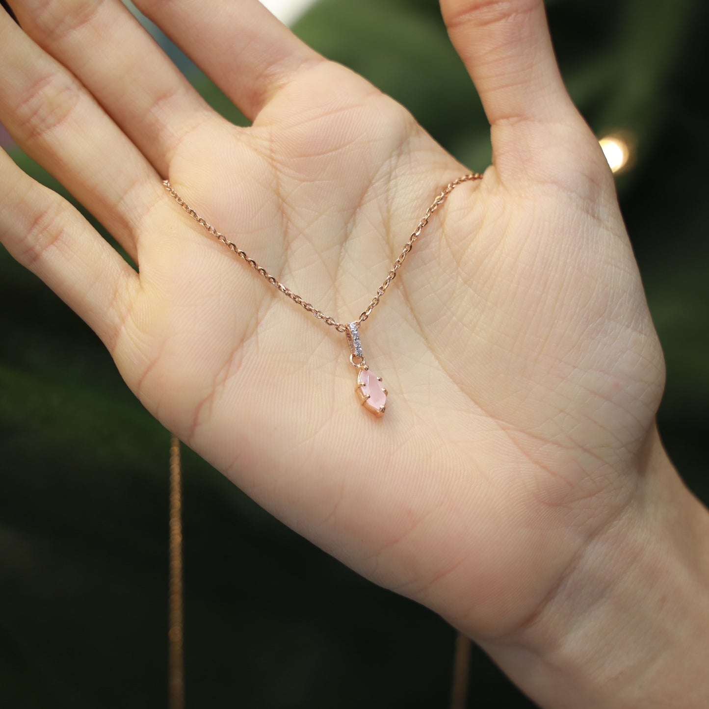 18kt gold rose quartz cz pendant