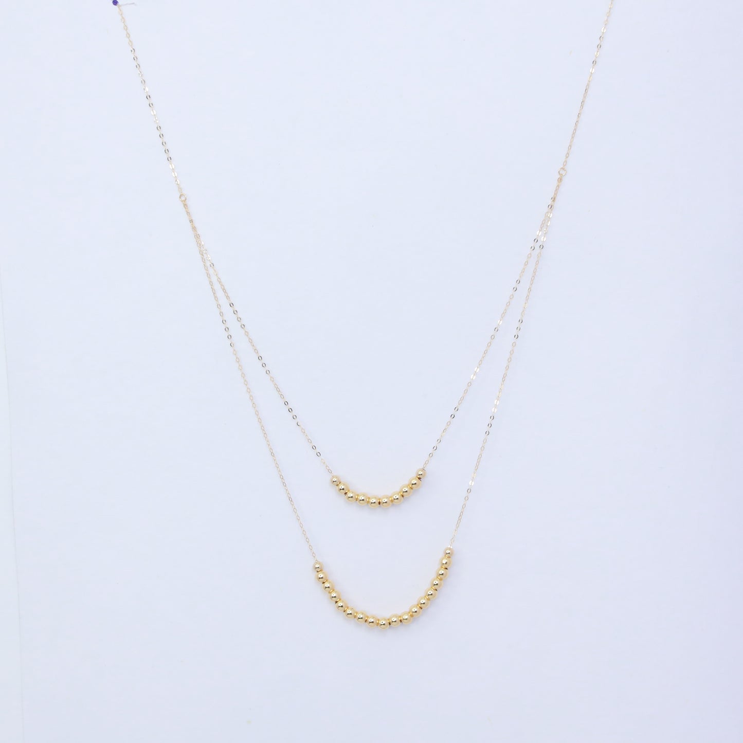 18kt gold two layer bead ball necklace