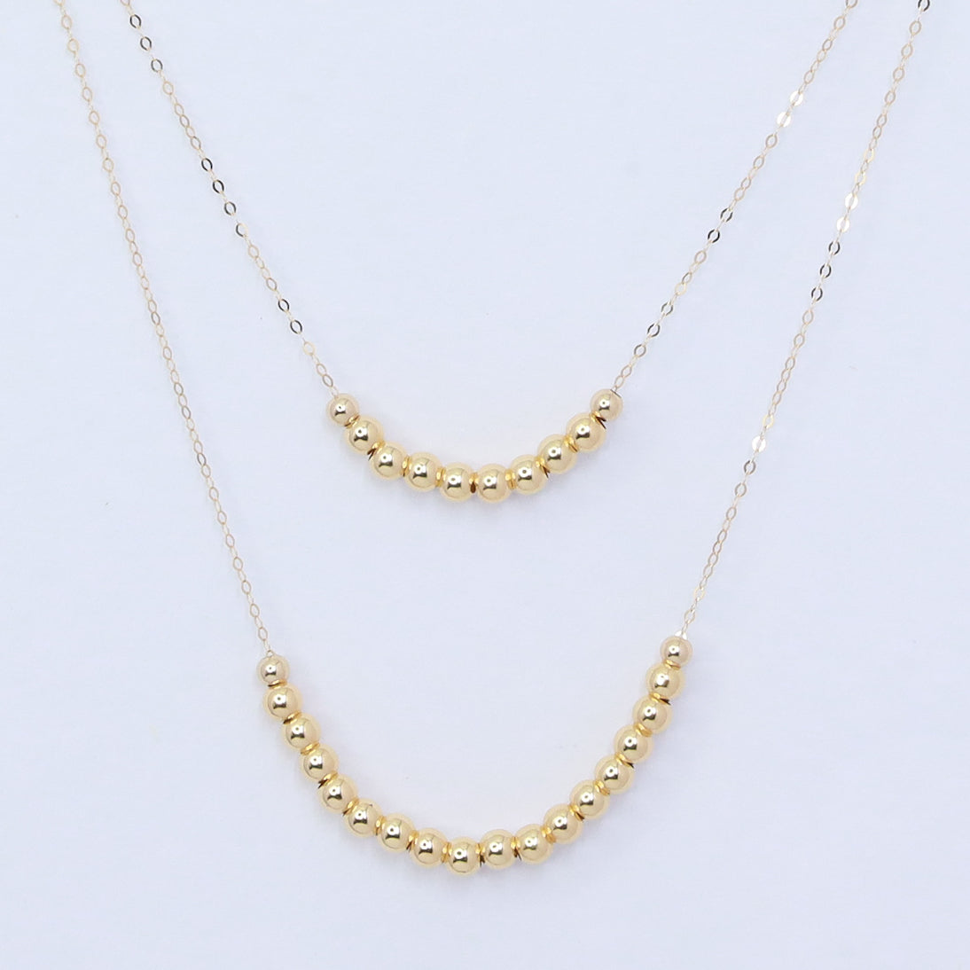 18kt gold two layer bead ball necklace