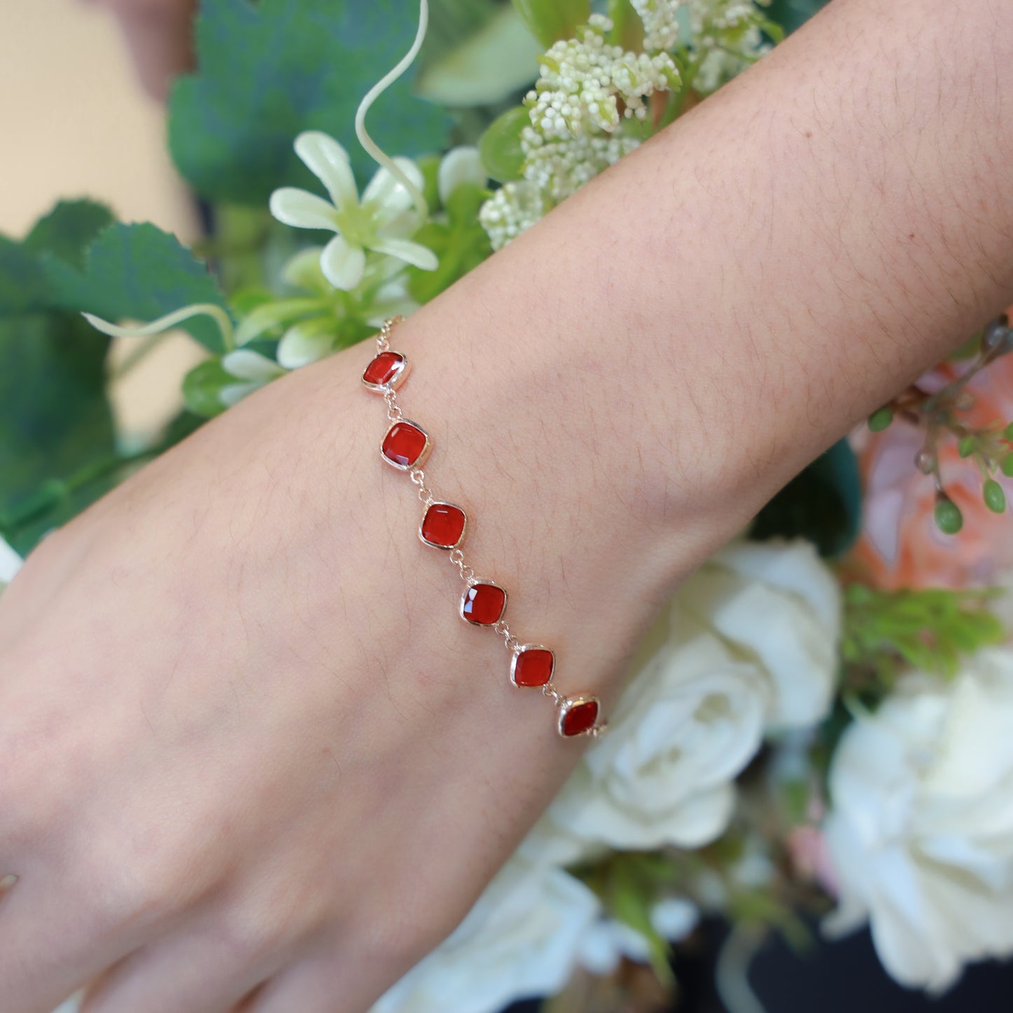 18kt gold red stone link bracelet