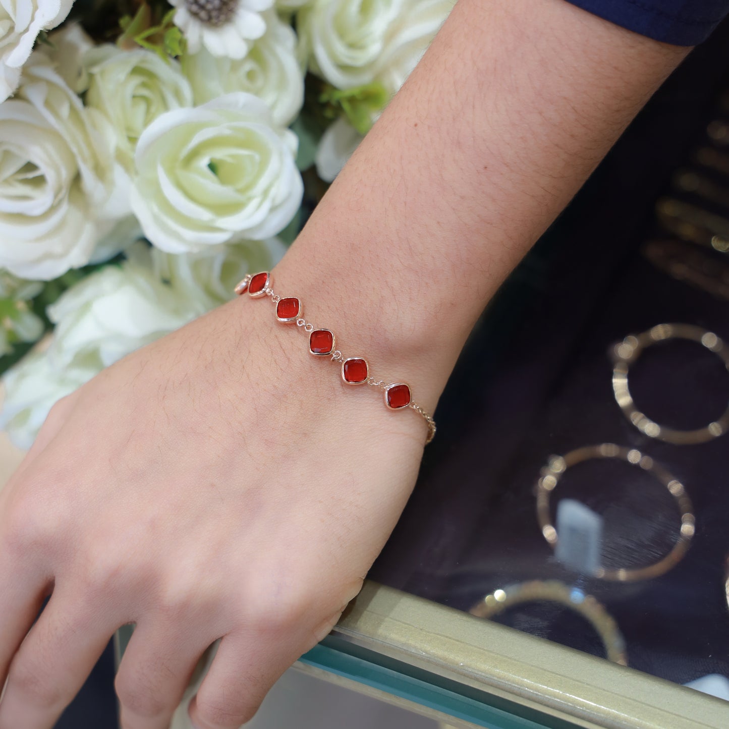 18kt gold red stone link bracelet